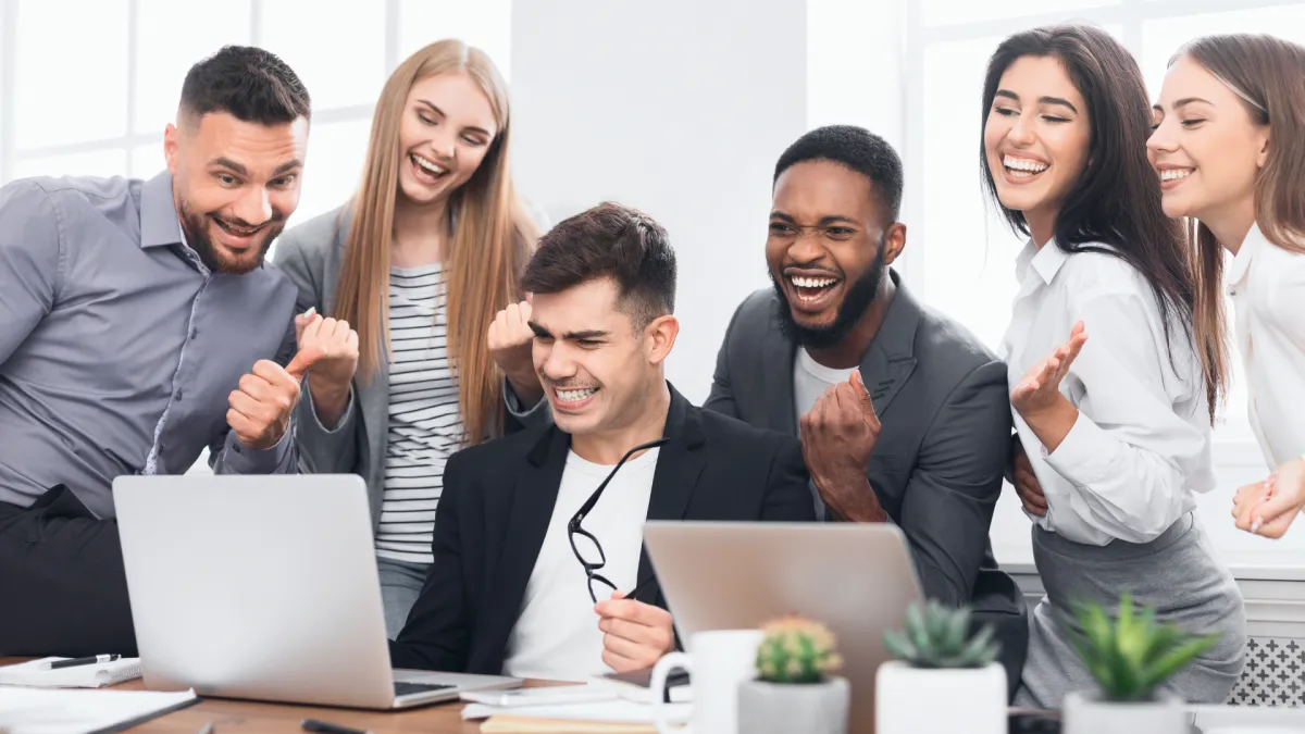 happy sales man on a business call