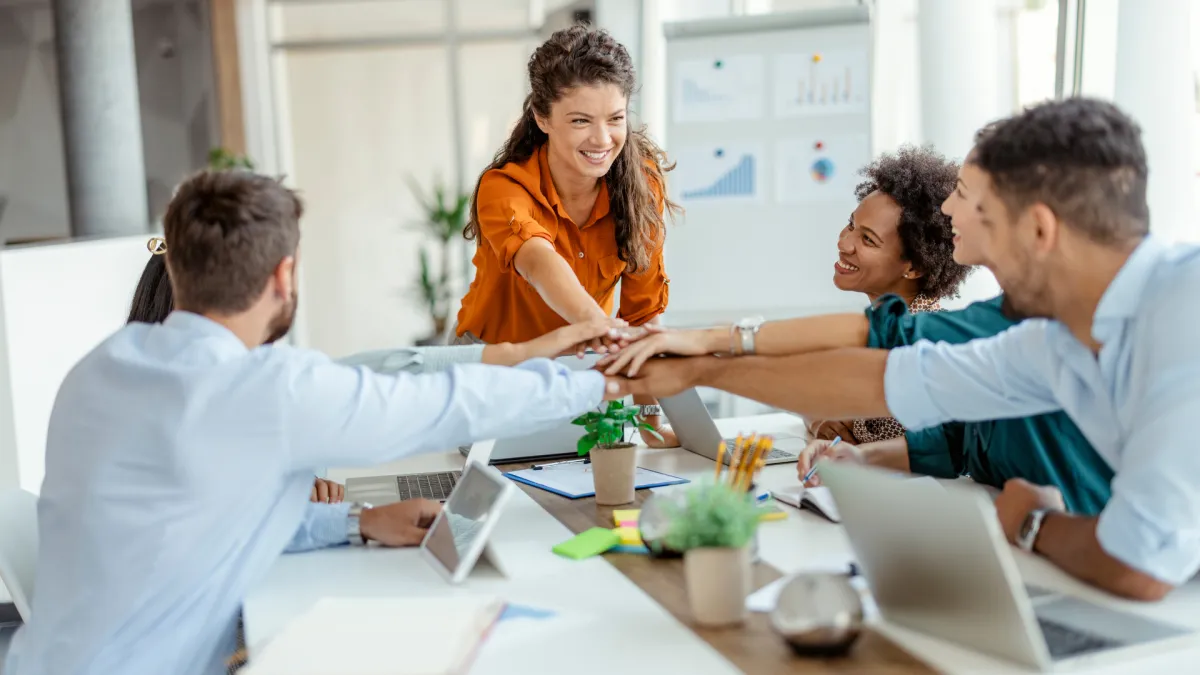 image of a team excited about their new outbound email strategy for b2b prospects