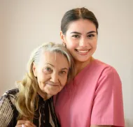 caregiver and elderly woman