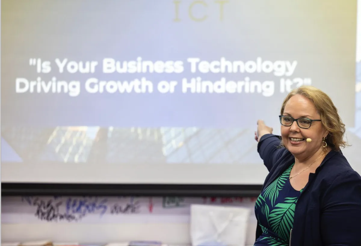 person holding orange flower petals