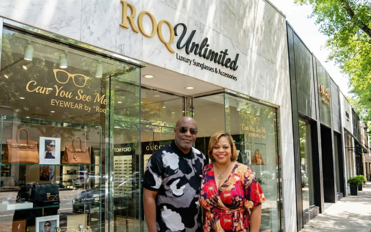 Hand-poured scented candle in a blush ceramic vessel with a gold-foil label, boxed next to a silk rose for partner product showcase.