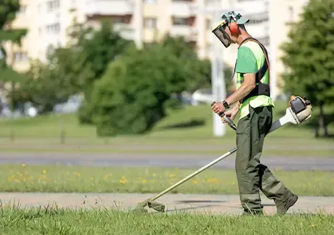 Grass edging and trimming service by Apple Valley Lawn & Snow.