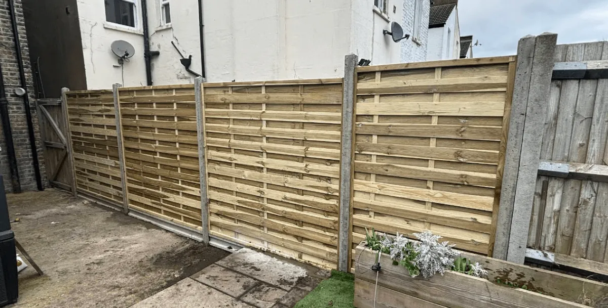 Wooden fence installation in a London back garden by Willis Building Services