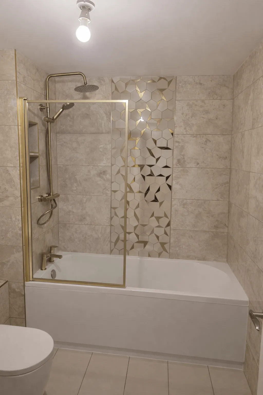 Marble tiled bathroom renovation by Willis Building Services London