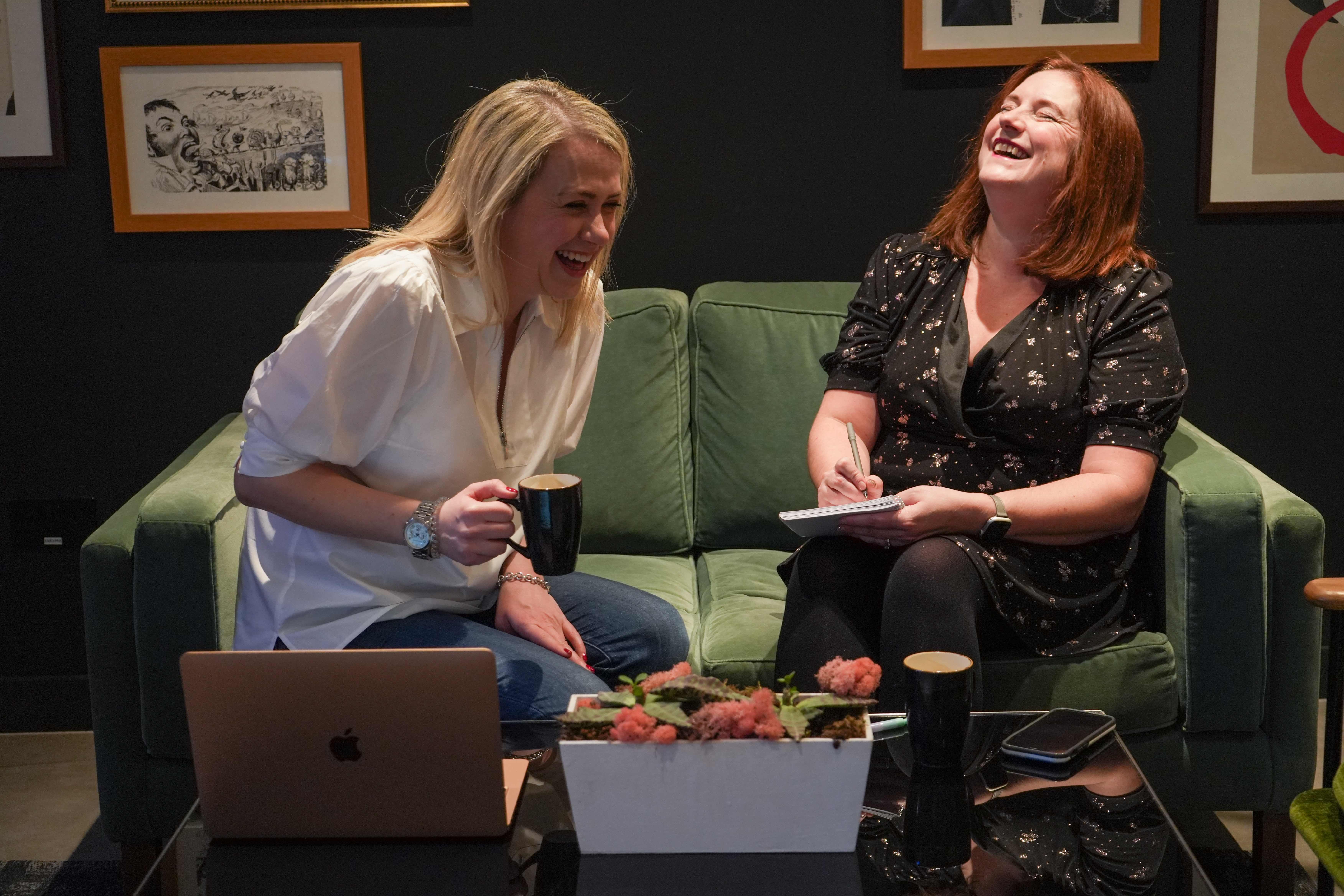 Daisy laughing with a client