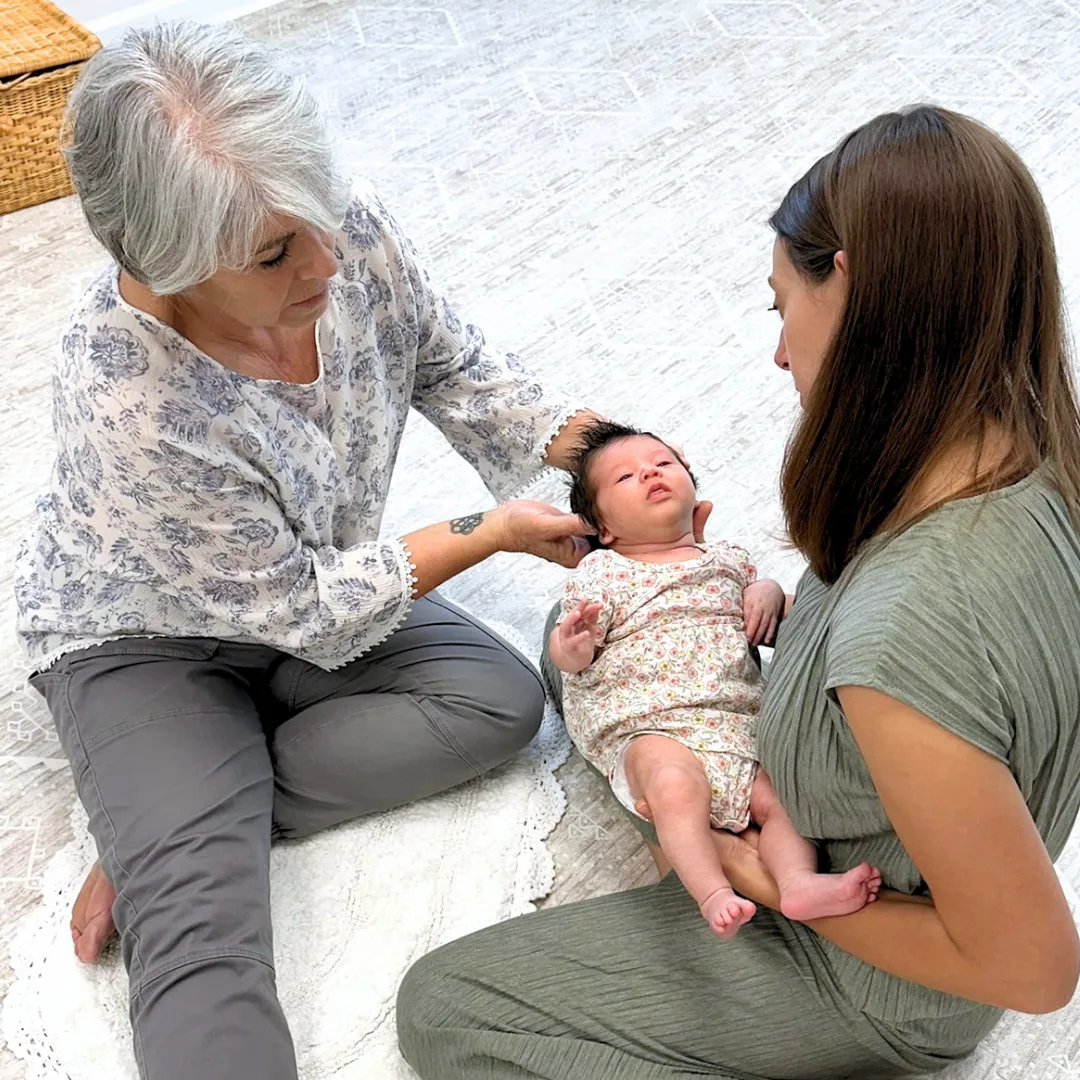 Blessed Beginnings Craniosacral Fascial Therapy session in Franklin, Tennessee, providing gentle infant bodywork that may support breastfeeding, bottle feeding, tongue tie recovery, reflux, body tension, torticollis, and nervous system regulation for families across Middle Tennessee.