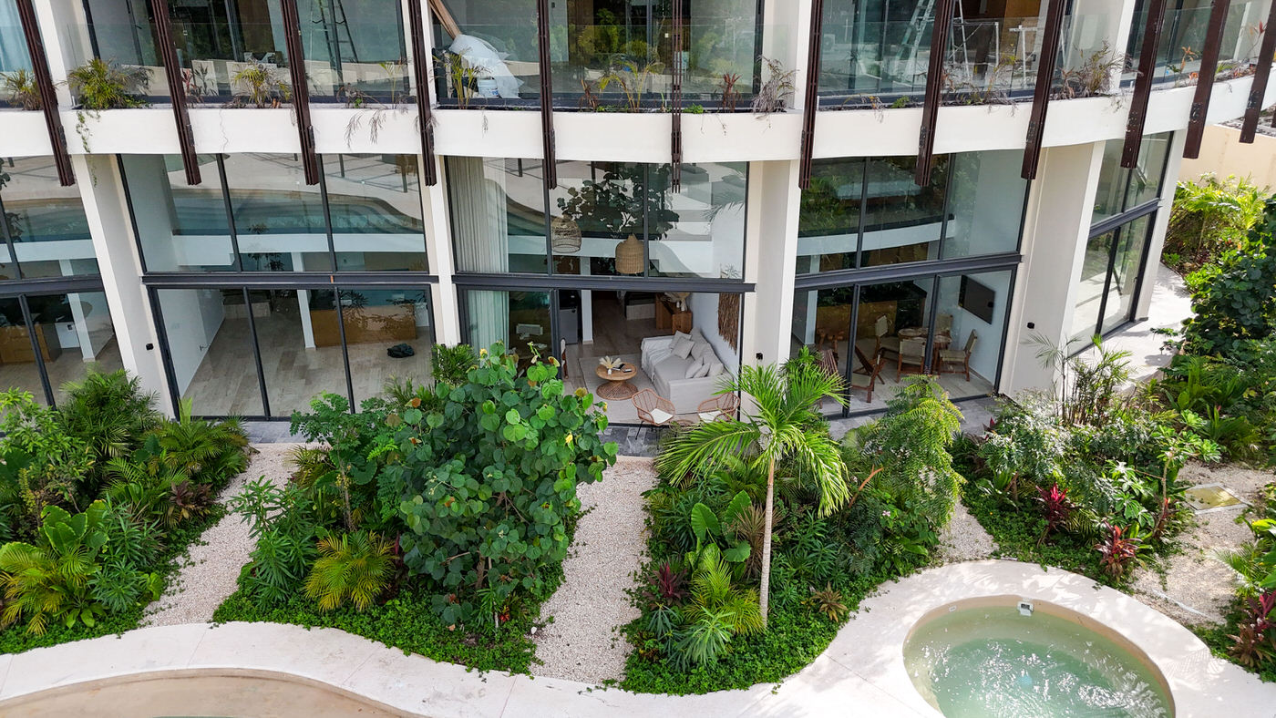 One bedroom loft for 4 guests in Tulum, Mexico | Stunning Floor to Ceiling Windows | Tropical Vacation Rentals Mexico