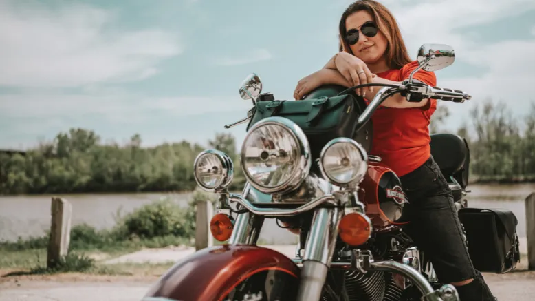girl in red shirt riding motorcycle