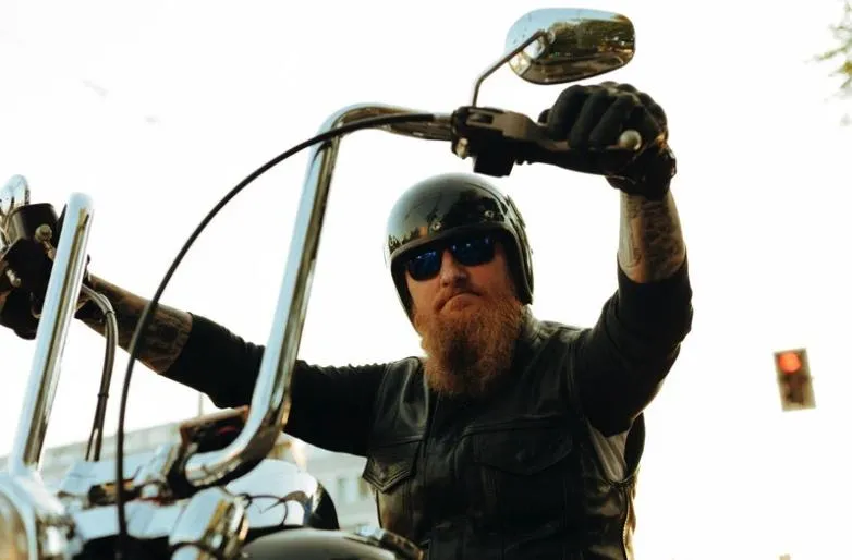 man riding sports bike