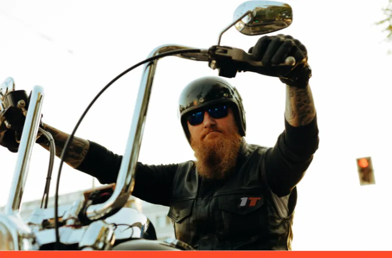 man riding sports bike