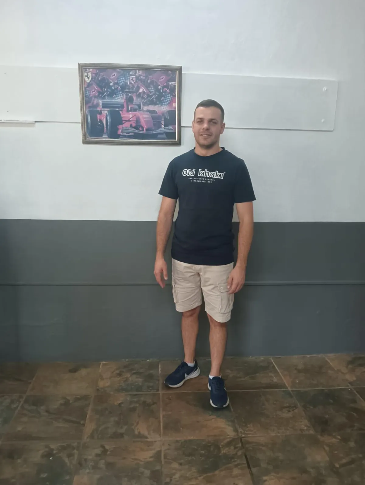 Battery Locals mobile technician replacing a car battery in a driveway.