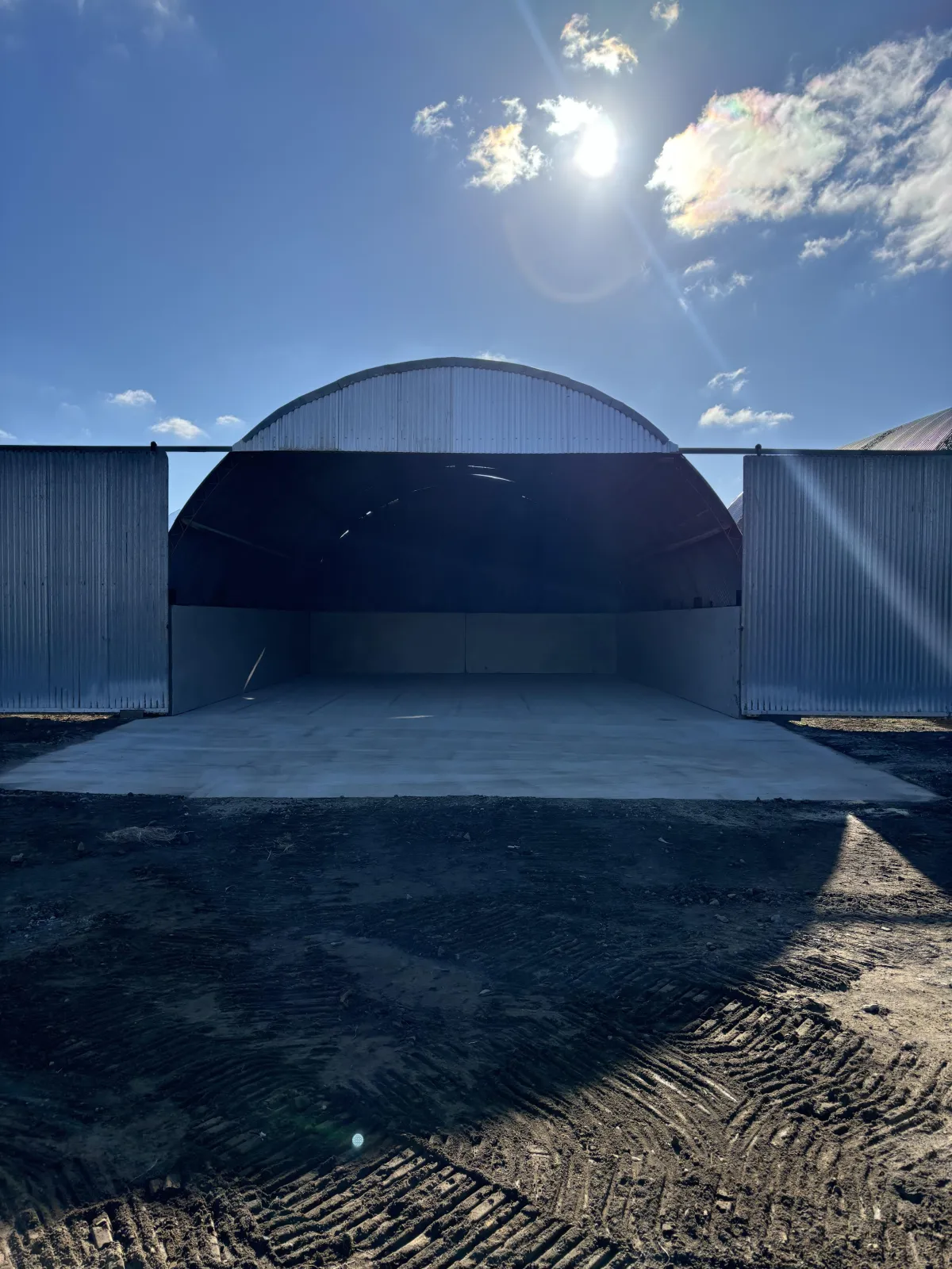 Completed concreting project for a farm building in Ohakune, showcasing smooth surface.