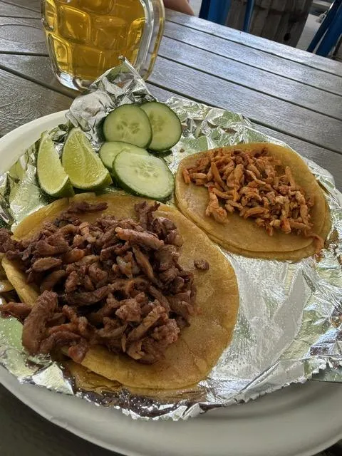 pizza with red and green vegetables