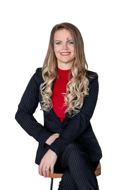 Modern suburban home at sunset with warm interior lights