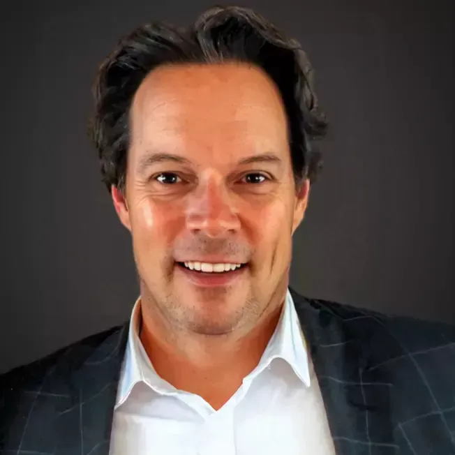 Portrait of a male agent with approachable smile