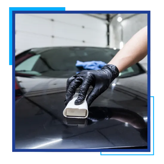 Auto ceramic coating application adding smooth protection to a car surface