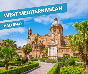 a man standing on top of a cliff overlooking a valley