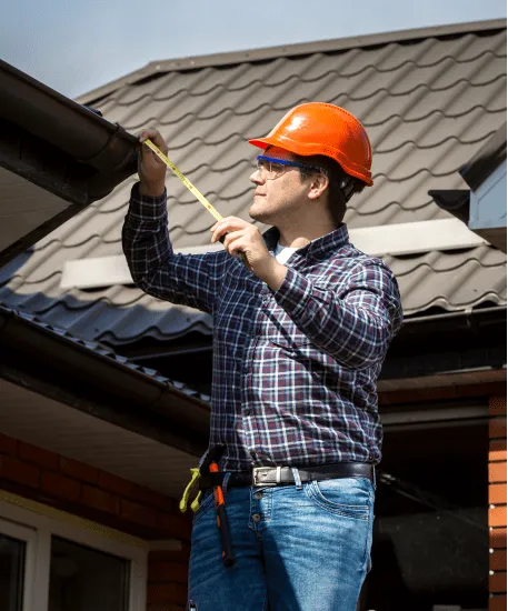 a man riding a skateboard on top of a roof