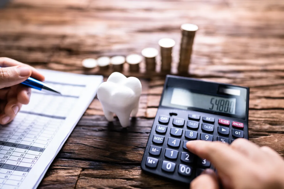 Business owner computing cost for dental insurance