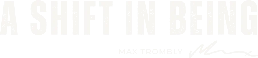 White text reads "A SHIFT IN BEING" above a handwritten signature.