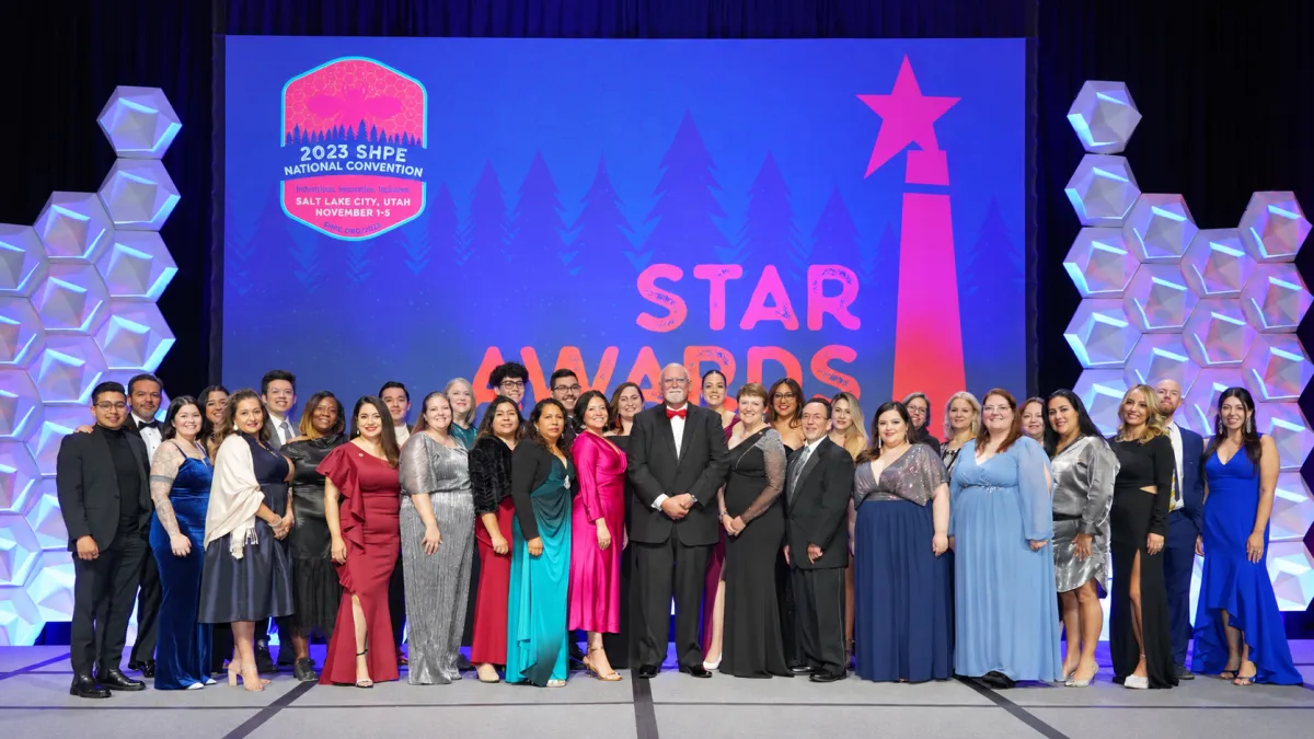 Executive networking gala with dramatic architecture and lighting
