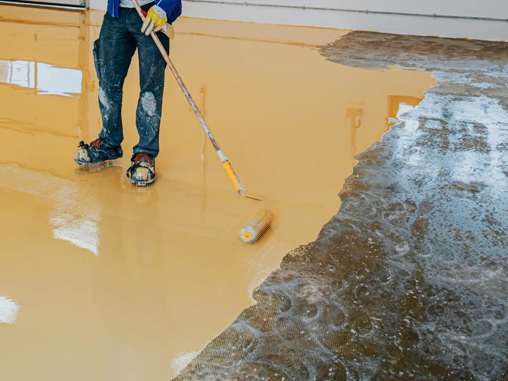 Gray epoxy floor coating applied in a residential garage in Fort Lauderdale