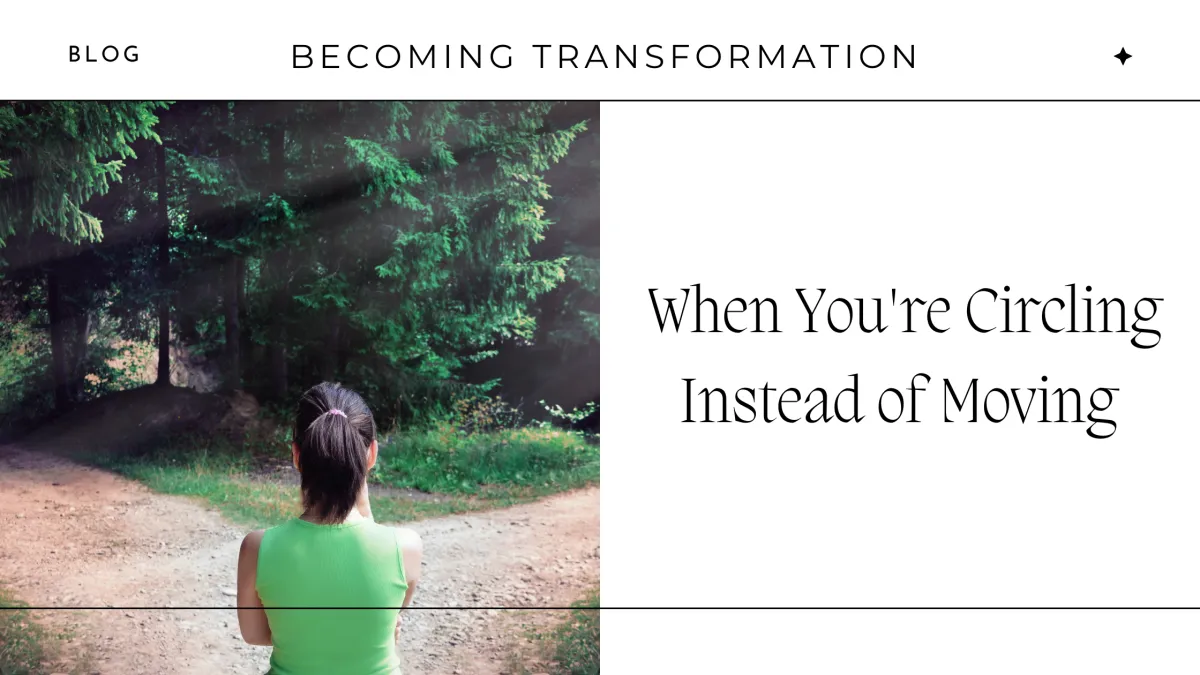 A woman standing at a fork in a forest trail, pausing thoughtfully before taking her next step.