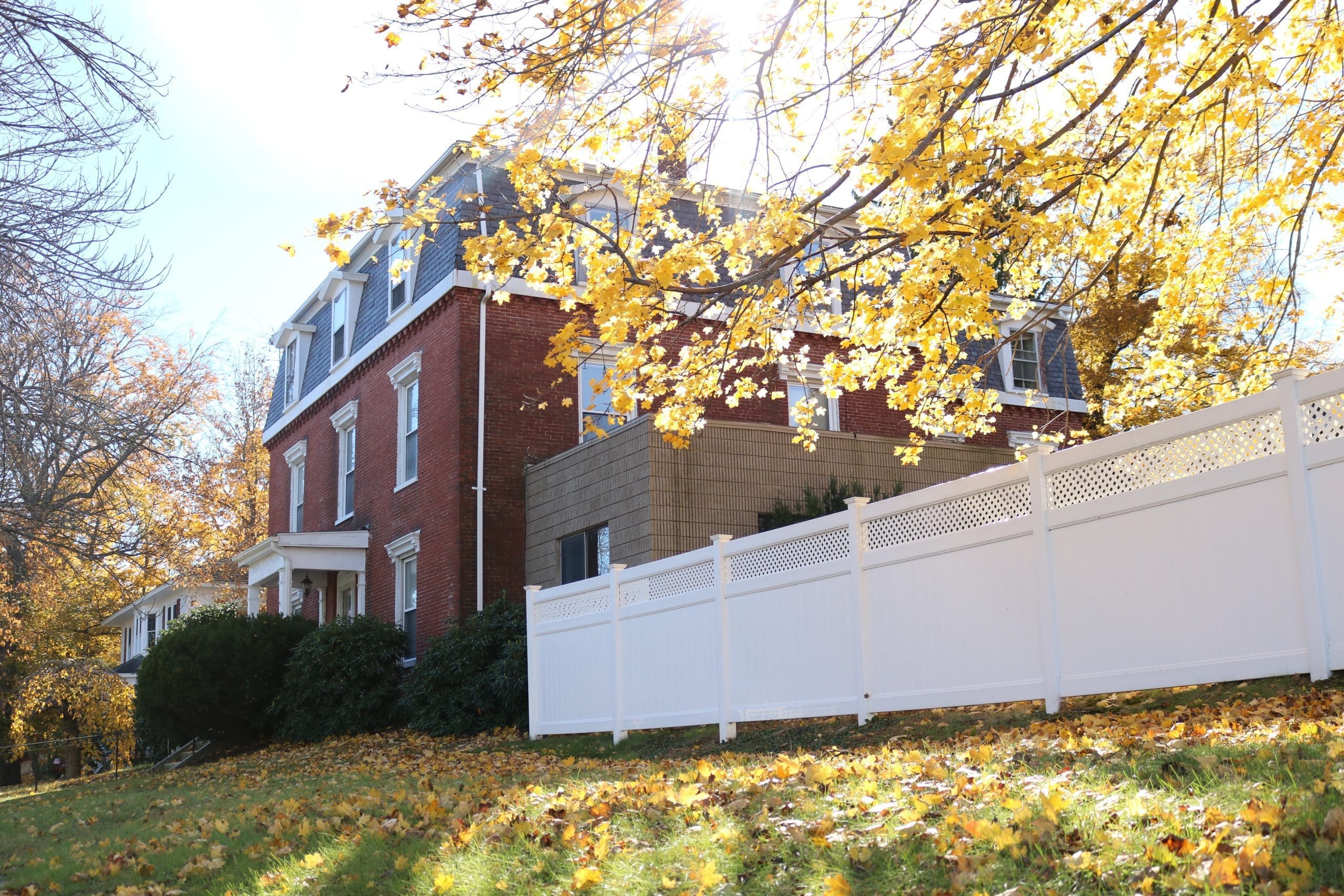 Exterior view of Forest Sober Living house in autumn