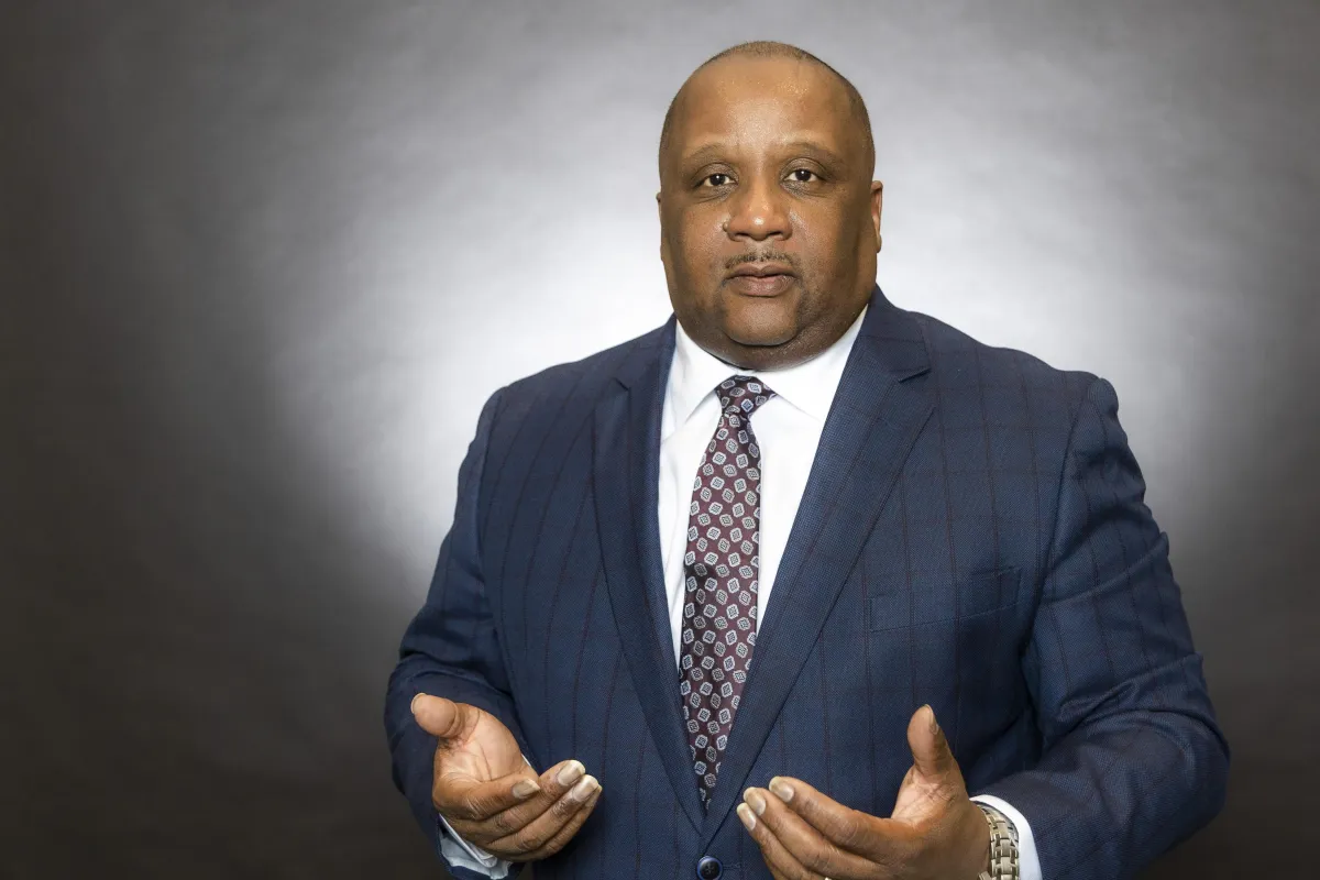 Commanding editorial portrait of Chief Alston