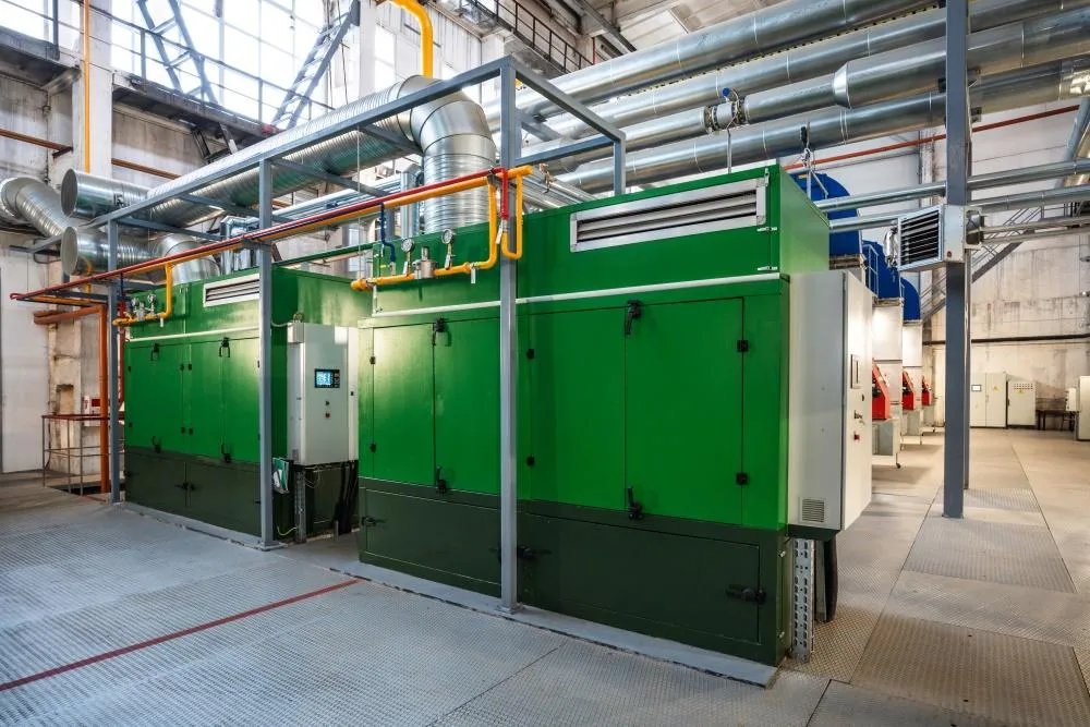 Large industrial generators installed in a commercial facility – part of ETS generator sales services in New England