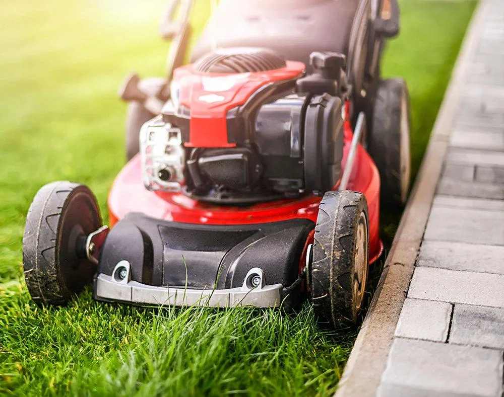 Lawn aeration equipment working on a residential lawn
