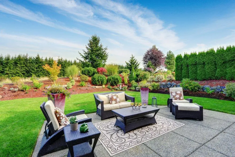 Beautifully landscaped front yard with seasonal flowers and greenery