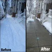 Residential snow shoveling service clearing driveway after a heavy snowfall.