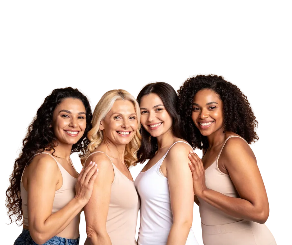 Group of diverse women smiling together, representing different ages and body types for Soul Serenity’s body sculpting services.