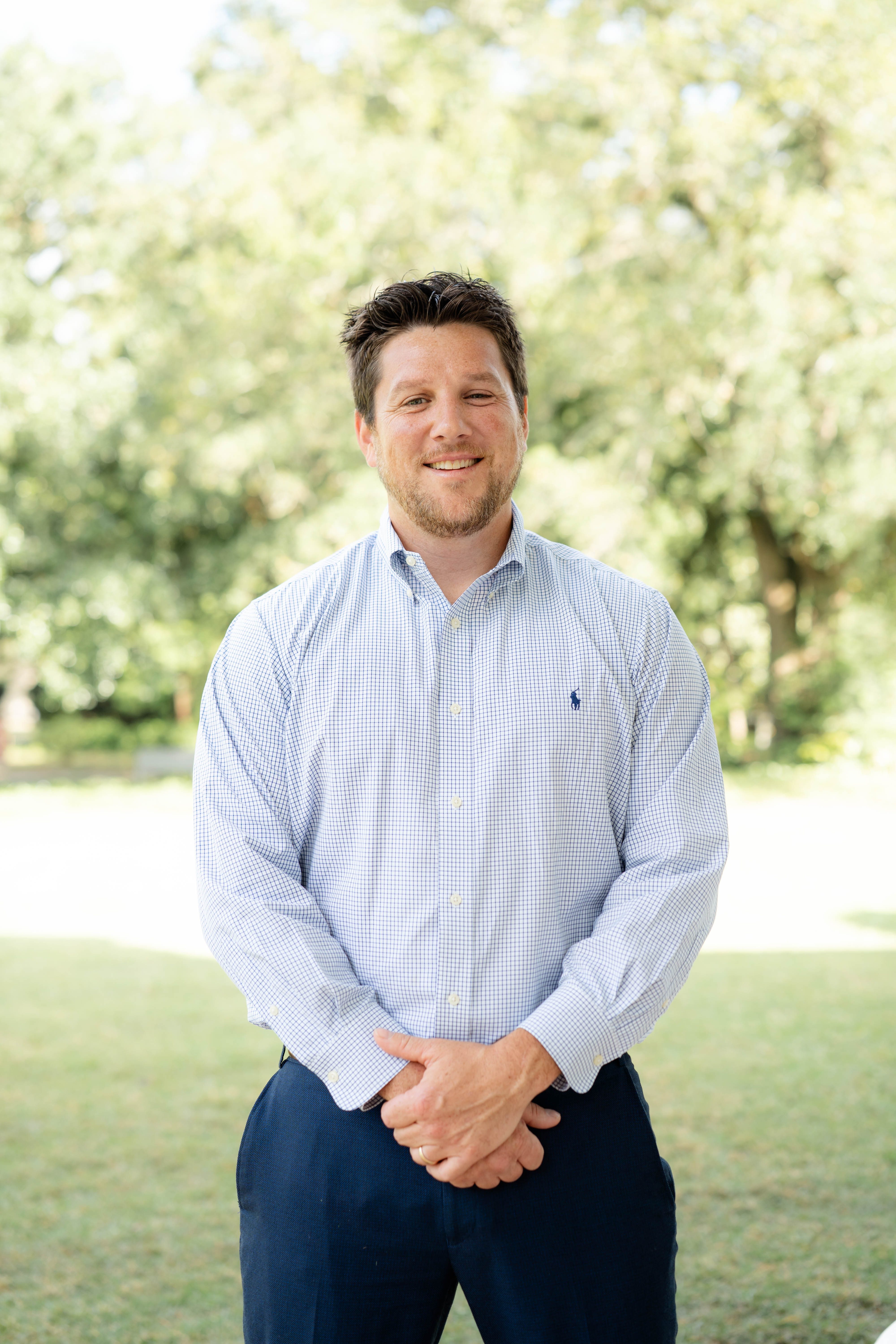 Blue sparkles shimmer on a gray asphalt surface.