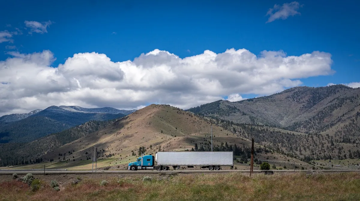 Professional semi-truck traveling on a highway