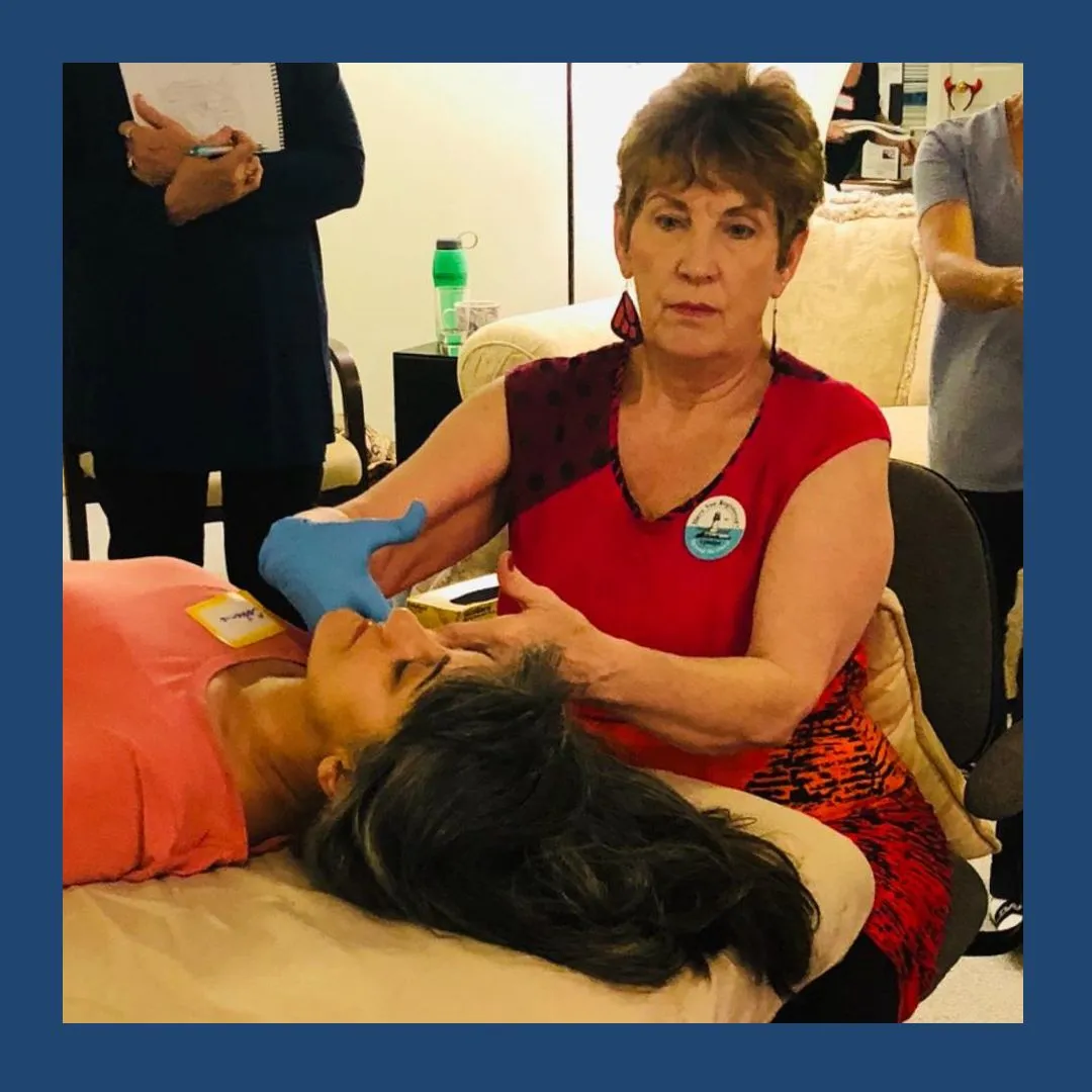 suzanne working on patient's mouth with gloves on