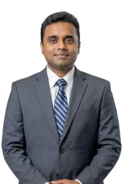 Professional headshot of Dr. Charan Surisetty