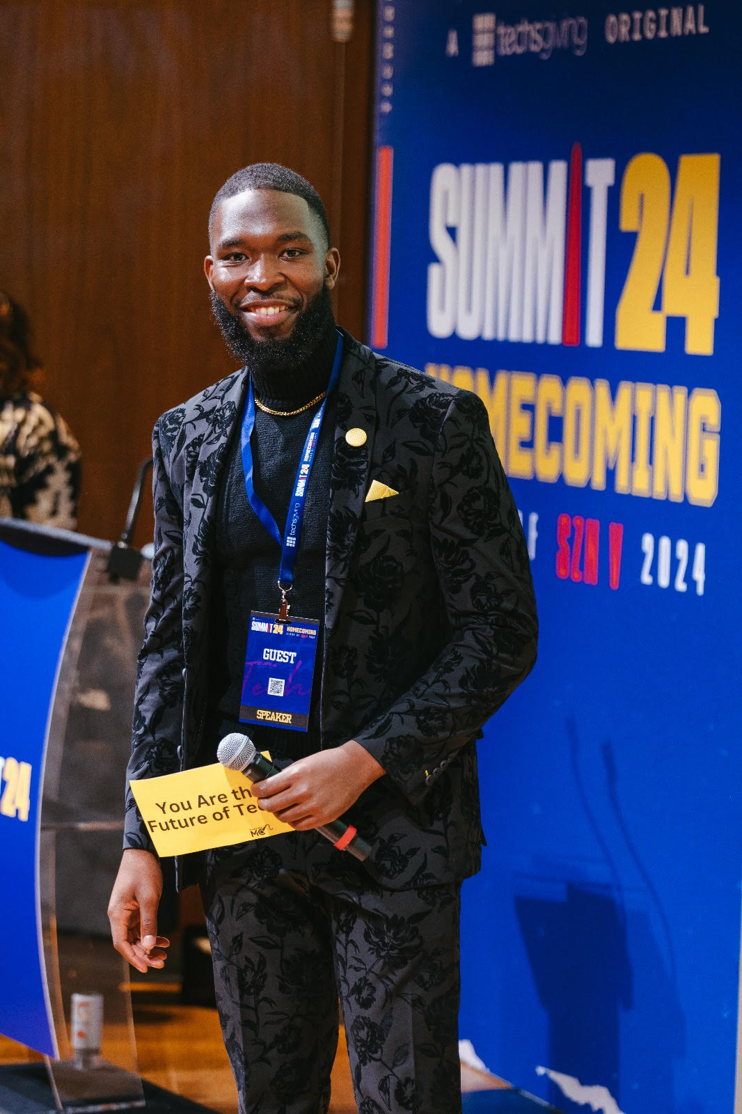 Nde Nkimbeng hosting a tech conference as professional emcee