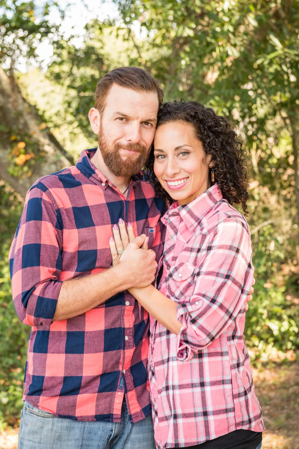 yellow butterfly on pink and white flower petal