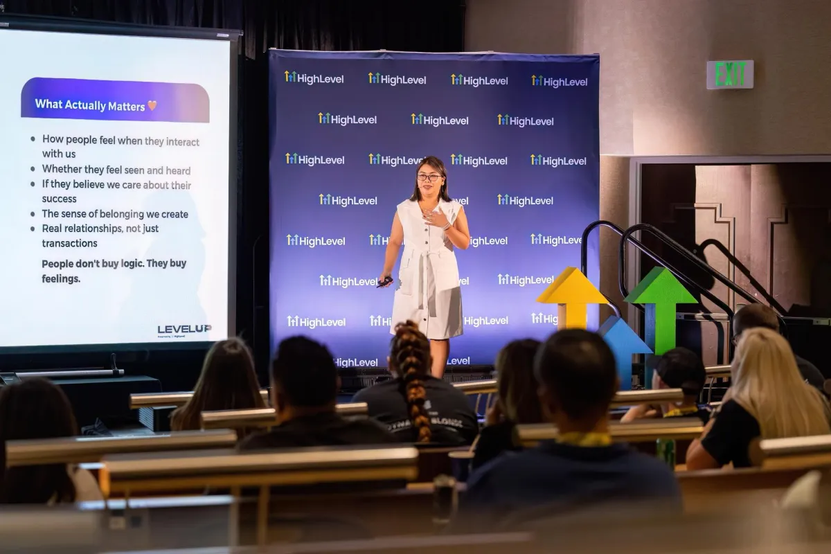 A Filipino virtual assistant looking frustrated at a cluttered screen, digital chaos around, muted SaaS palette, 1:1 aspect ratio