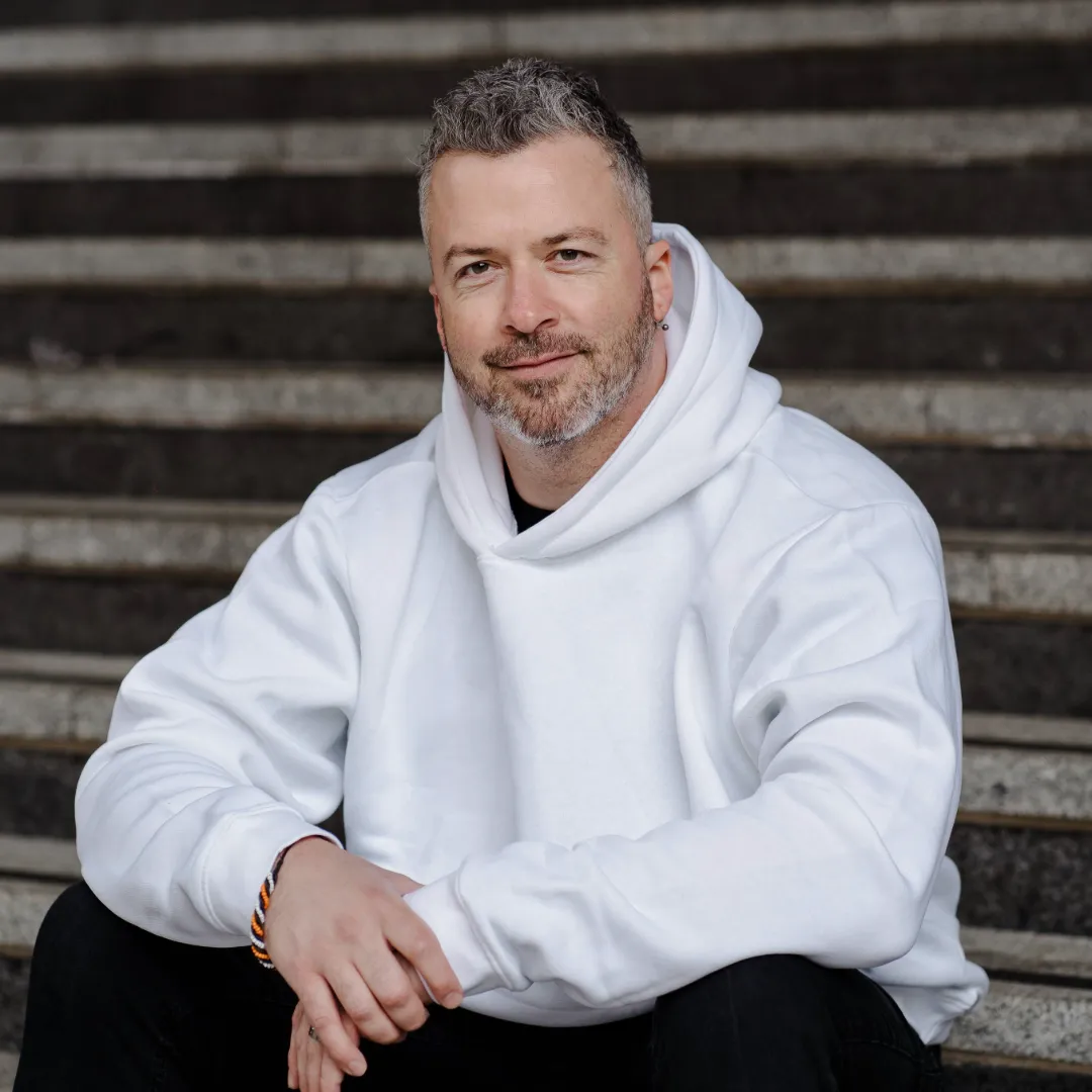 Andy Casey 121 Coach White Hoodie concrete steps  Bristol Harbourside 