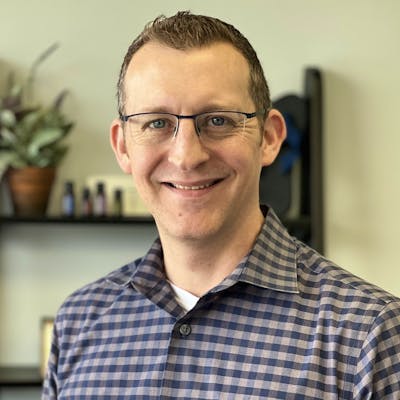 Professional photo of Dr. Hertz inside the clinic