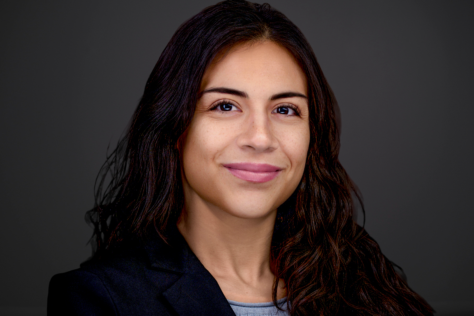 Clean corporate headshot in Memphis office setting