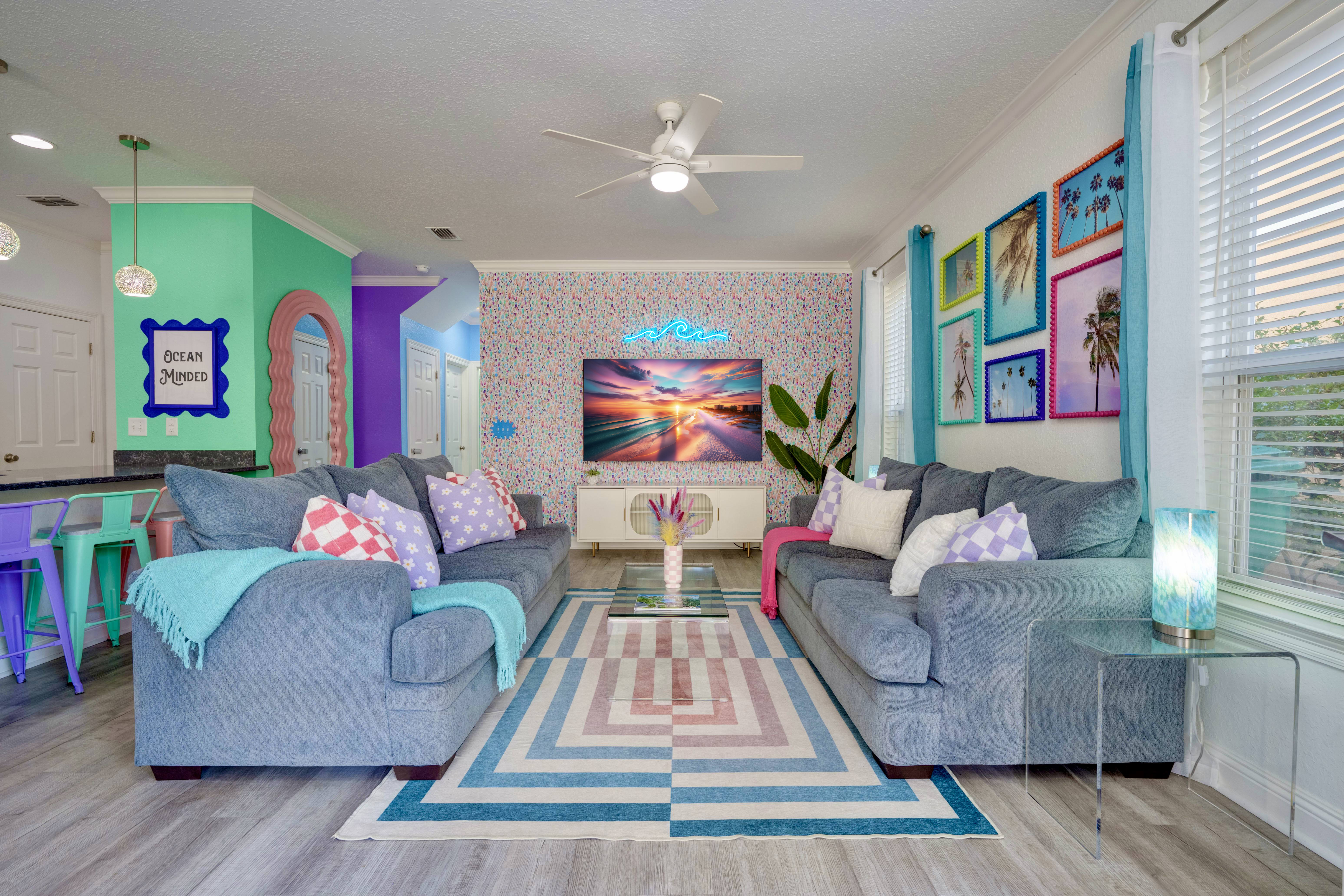 Spacious vacation rental with pool and outdoor seating at dusk