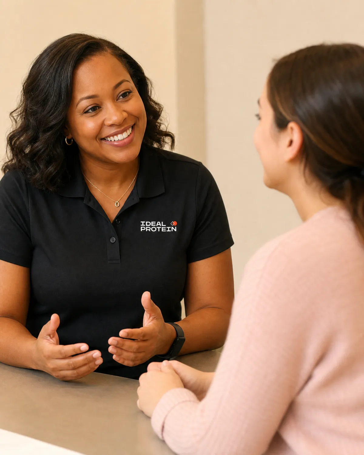 Ideal Protein certified coach in a one-on-one coaching session with a client