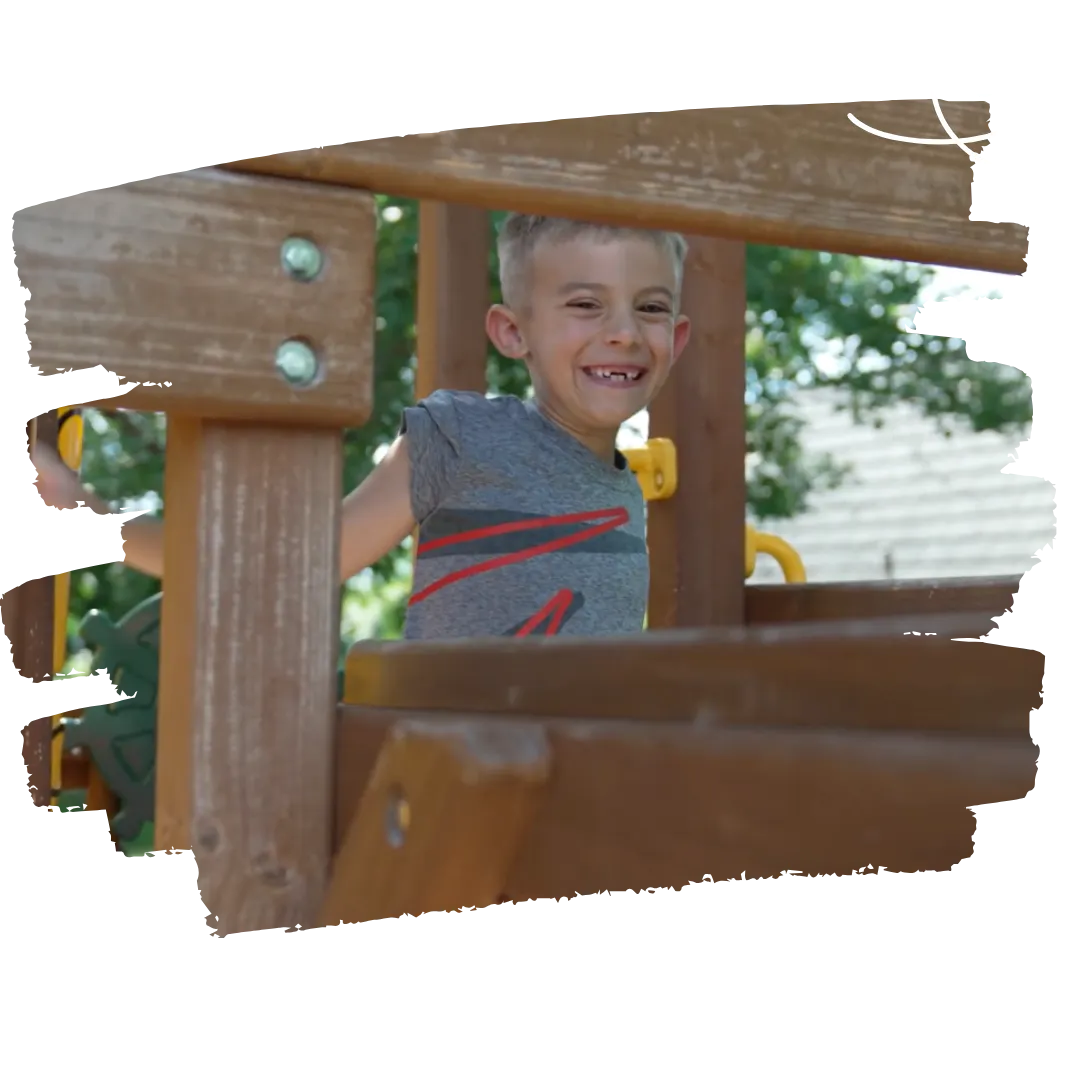 preschooler playing in outdoor space