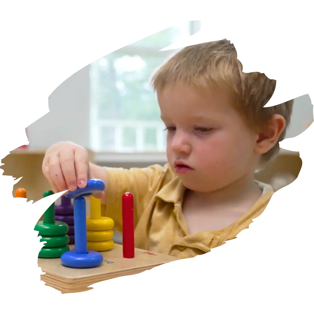 toddler playing in school