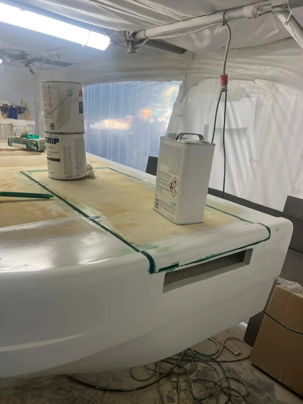 Rebuilt platform in primer with teak recesses masked