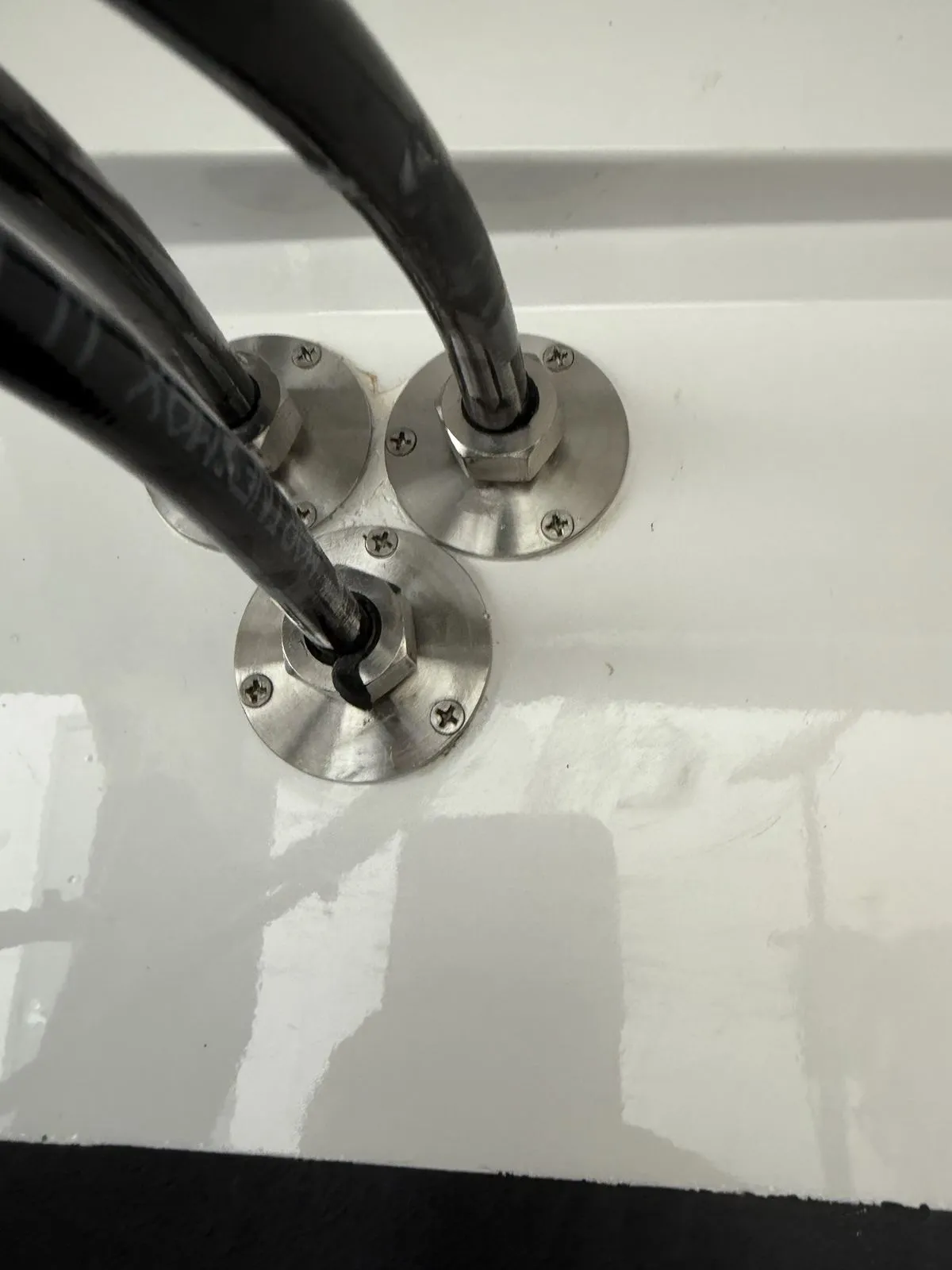 New stainless hydraulic hose glands through the transom